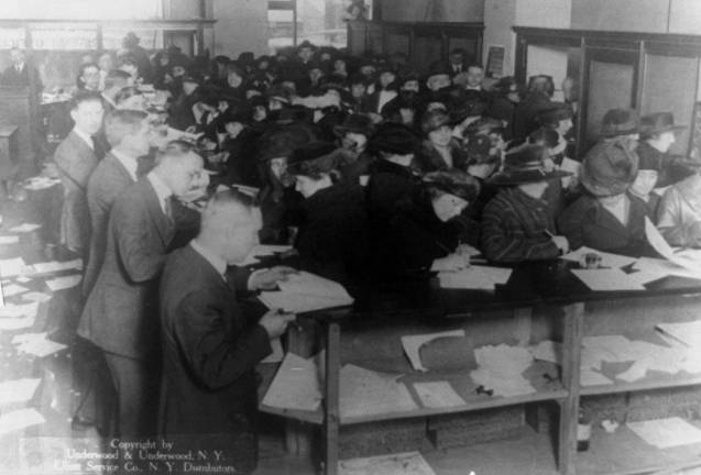 AARP Tax Aide Services for all ages returns to the Greenwood Lake Public Library in February This photo from the Library of Congress shows a large group pf people fillingn out forms in the Internal Revenue office in 1920. Oh, how things have changed.