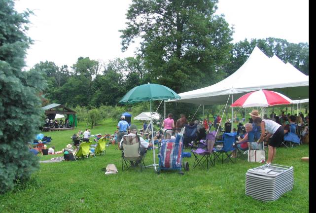 Music festival raises money for hippotherapy center Photos by Roger Gavan Guests had a choice of seating on the picturesque grounds of the Warwick Valley Winery.