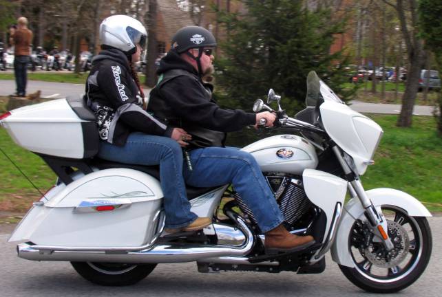 Blessed are the bikers The Rev. Angelo Micciulla invited his teenage niece Joziey Roman, 15, to ride with him on his Victory Cross Country Tour machine.
