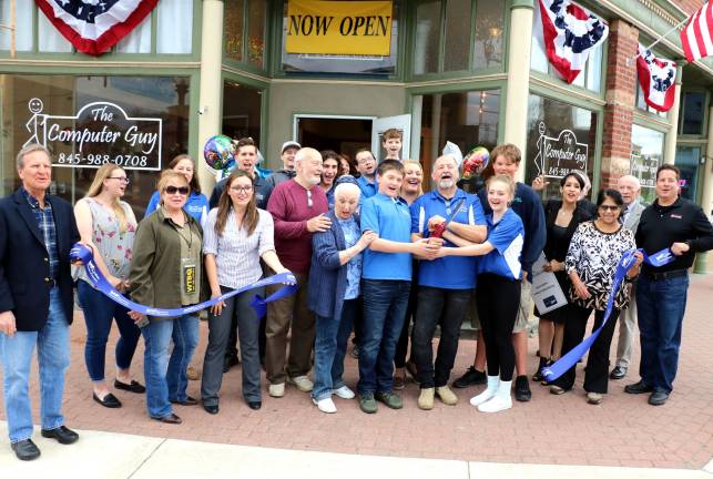 Computer Guy opens third new location in Goshen Photo by Roger Gavan On Friday, April 19, members of the Goshen and Warwick Valley Chambers of Commerce joined owner Kevin Brand (center), his wife, Roxanne, family and staff, for a ribbon cutting ceremony to celebrate the new store's grand opening.