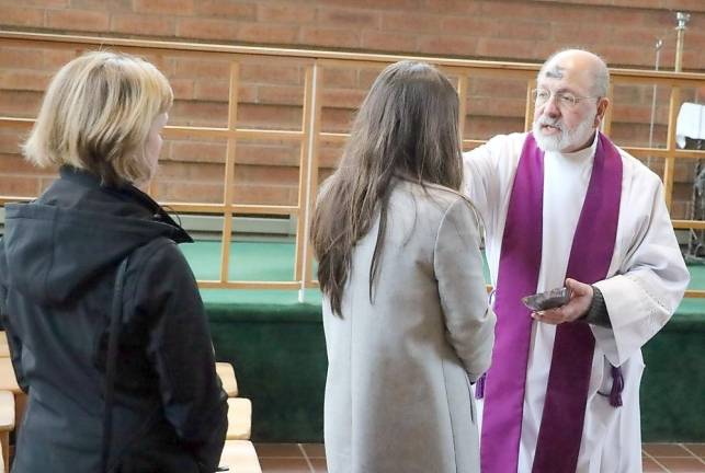 Last year the Rev. Jack Arlotta administered ashes to parishioners of the Church of St. Stephen, the First Martyr. But this year those who attended Mass or a service at Warwick’s Church of St. Stephen, the First Martyr, were given ashes contained in a small packet that were blessed and given out to be imposed at home.