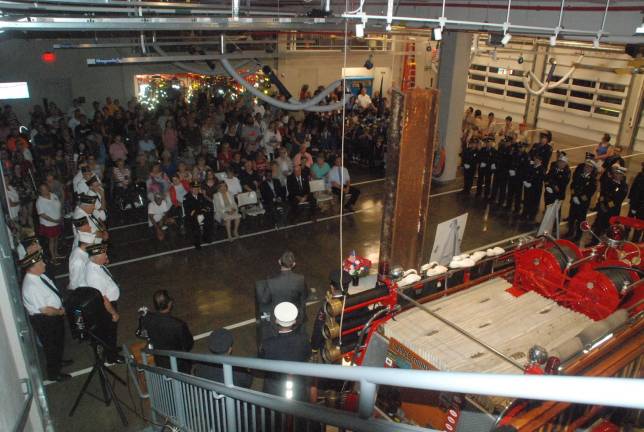 The Greenwood Lake community came together at the firehouse Wednesday night to mark the 18th anniversary of the Sept. 11, 2001, attacks on the country. Among those who died that day was Greenwood Lake resident Linda Grunlund. Our job, as citizens of this great nation, is to join in remembering those who were lost that day, and the days after, Mayor Jesse Dwyer said in his weekly blog. Our job is to never forget.