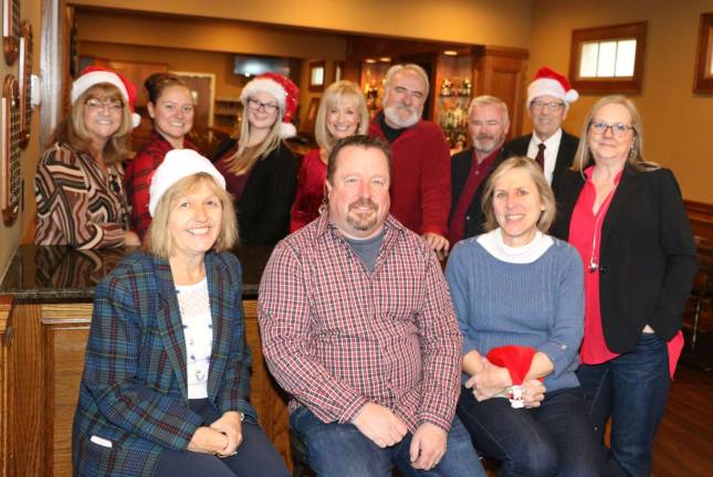 Warwick Valley Chamber of Commerce to host Holiday Mixer at Warwick Country Club Photo by Roger Gavan Planning for the Warwick Valley Chamber of Commerce Holiday Mixer on Dec. 4 are seated, from left: Warwick Valley Country Club board members Chris Stage, Chris Zimmerli and Cal Durland. Standing from left, Warwick Valley Chamber of Commerce Programs Committee members Mary McClurg, Kristen Weiss, Bea Arner, Janine Dethmers, John Redman, Michael Johndrow and Sarah Armand.