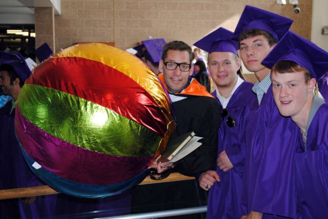 The Warwick Valley Class of 2013 Photo by Louise Hutchison Principal Richard Linkens celebrates with grads George Neubauer, Ryan Knapp and Sean Peters.