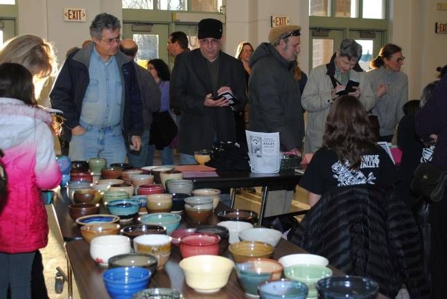 'Empty Bowls' fundraiser shines a light on hunger At last year’s Empty Bowls event, attendees selected a favorite bowl to purchase. Bowls are made and donated by local potters to support the fundraiser.