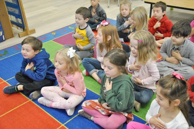 Kindergartners at Sanfordville Elementary start their school day with a mindful moment to quiet themselves, invite a kind attitude and bring their focus to the classroom.