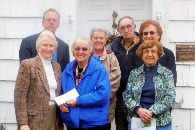 High School alumni contribute to Shingle House restoration The alumni of the Warwick Valley High School Classes of 1943, '44, '45, '46, '47 and '49 are donating $1,885.45 to the restoration of the "Shingle House" on Forester Avenue. Pictured from left to right, beginning in the front row, are: Pat McConnell, president of the Historical Society of the Town of Warwick; Claire Garcia; and Joan Putnam; and in the second row: Robert Schmick, executive director of the historical society; Evelyn Card; Robert Ball; and Janet Folino.