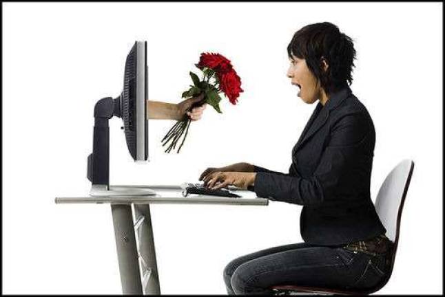 Pew: Love is in the air and on the Web Woman receiving roses online
