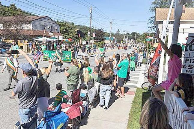 The crowds cheered for marchers during the Halfway to St. Patrick’s Day Parade last Sunday in Greenwood Lake.