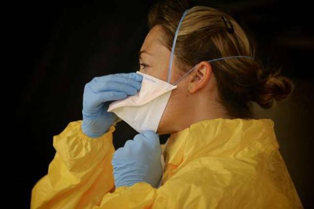 CDC developed a training course for U.S. healthcare workers deploying to work in an Ebola treatment unit in West Africa. (CDC Photo: Nahid Bhadelia)