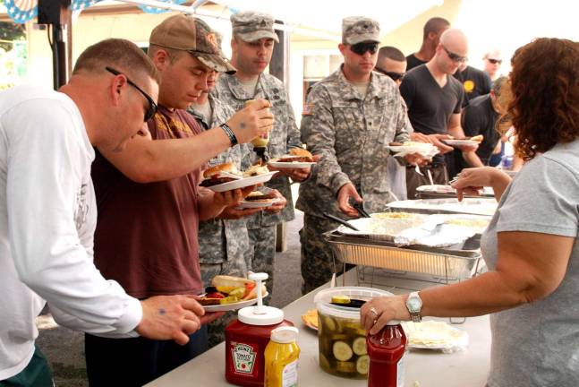 GWL American Legion host barbecue for troops Photos by Ed Bailey If an army travels on its stomach, then members of the U.S. Armyís Tenth Mountain Division were well-fueled thanks to the largese of the Greenwood Lake American Legion Arthur Finneganís Post 1443.