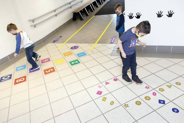 The sensory path “helps the kids with their motor planning, their balance, their vestibular system and also their visual system just by being able to follow along,” said Kristen Longo, one of the three occupational therapists who designed, created and installed two pathways for kindergarten students at Pine Island Elementary. “Because you’re using your senses with the learning, it helps your body and brain to take it in better.”