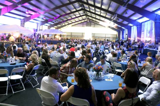 Annual Sunset at Winslow Gala to be held June 15 On Saturday evening, June 16, over 400 guests gathered in Winslow’s Ruth B. Ottaway indoor arena, transformed into a huge colorful nightclub, where they enjoyed a cocktail hour followed by dinner catered by award-winning chefs from The Helm Restaurant in Greenwood Lake and dancing to the music of the popular CloudNYne Band.