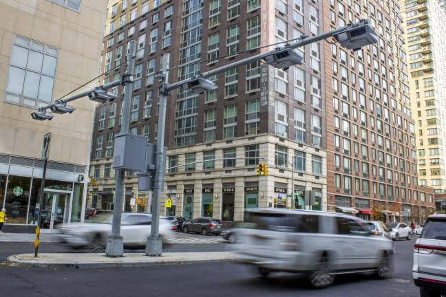 Congestion pricing takes a toll on local commuters Recently installed toll traffic cameras hang above West End Ave. near 61st Street in the Manhattan borough of New York, Friday, Nov. 16, 2023. The start date for the $15 toll most drivers will be charged to enter Manhattan’s central business district will be June 30, transit officials said Friday, April 26, 2024. (AP Photo/Ted Shaffrey, File)