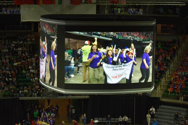Warwick Middle School wins Odyssey of Mind world championships Warwick students and longtime Odyssey coach Donna Denny lead the New York contingent at the opening ceremony parade at Michigan State University May 21.