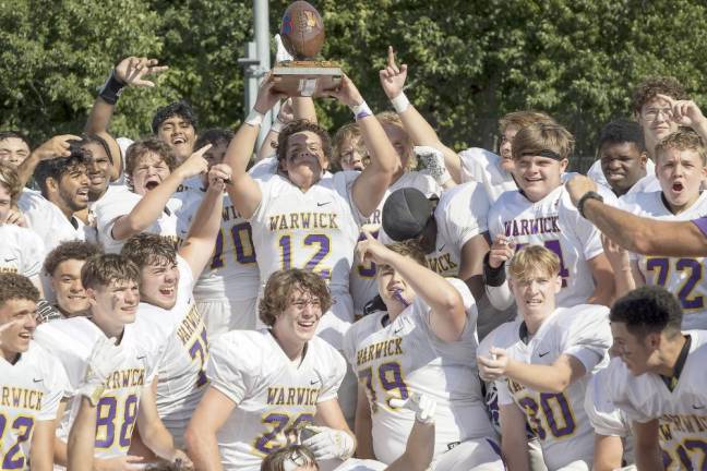 The Wildcats raised Spirit Trophy following their 20-6 victory over Goshen on Saturday, Sept. 11. Photo by Tom Bushey/WVSD.