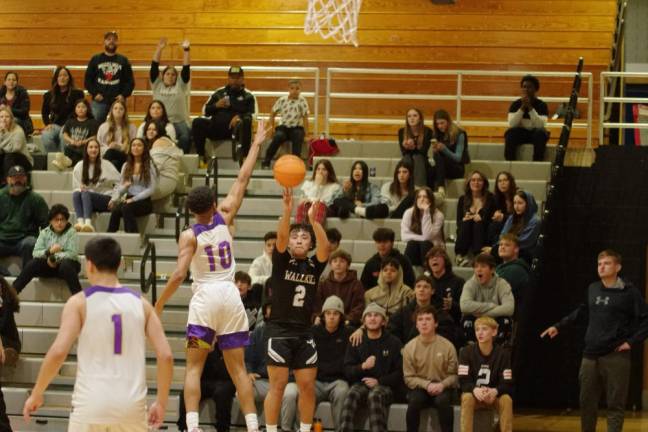 Wallkill Valley's Dylan Klackowski (#2) attempts a shot from long range in the second half. Klackowski scored 10 points.