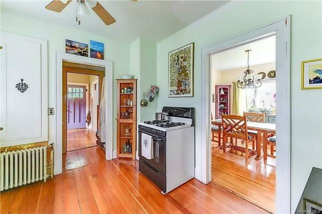 Charm and village convenience with quiet patio over fenced yard