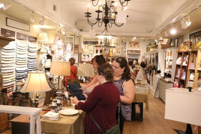 As they strolled along the streets of downtown Warwick, local residents as well as out-of-town visitors enjoyed visiting shops, like Frazzleberries.