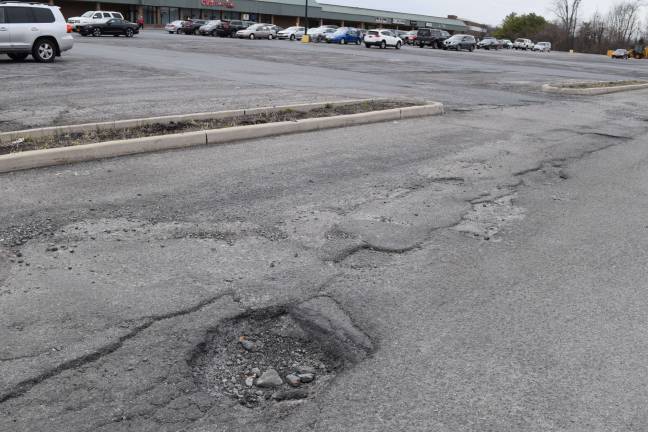 Submit a pothole you want to see fixed Do you have a pothole that needs to be fixed in your community? The Goshen Plaza parking lot in Goshen, N.Y. has been full of potholes for years.