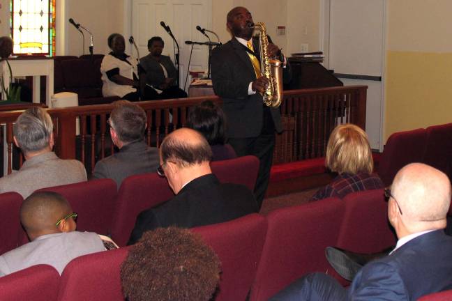 Celebrating Martin Gospel jazz saxaphonist Tony Smith lent music to the celebration.