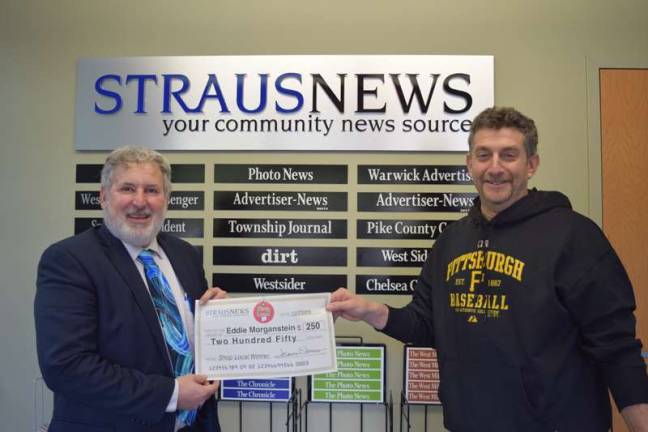 Another local shopper takes home prize Frank Curio, the director of sales and marketing for Straus Newspapers Inc., presents a check for $250 to Eddie Morgentstein, the most recent winner of the Straus News Shop Local Sweepstakes. He entered the contest by submitting his receipt from Okaeri Sushi and Hibachi in Monroe.