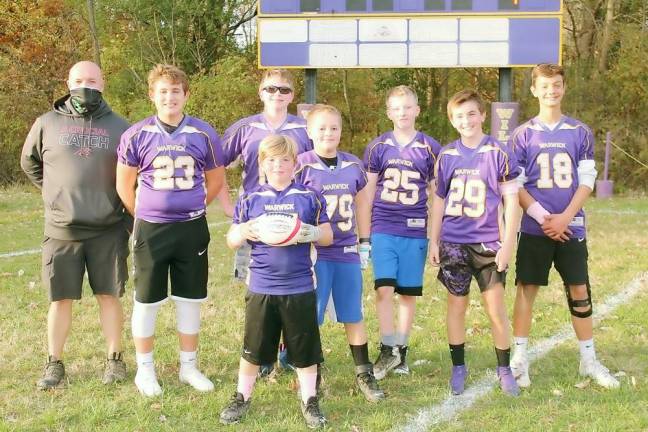2020 Warwick D3 Champions: Coach Chris Perron, Grant Havell #23, Matthew Lupkovich #60, Joey Storms #79, Tommy Knox #25, Luke Beattie #29, Marco Green #18 and Christian Perron with the football.
