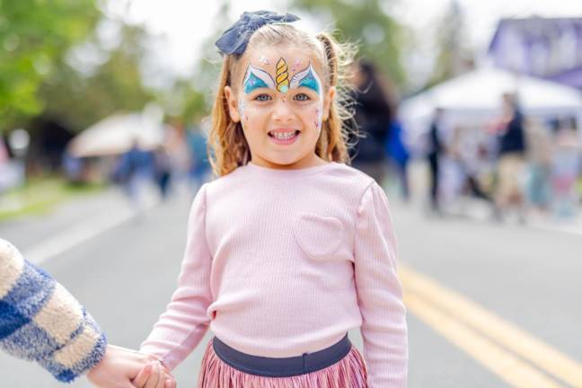 Savannah, 4, of Chester, got her face painted at the Sugar Loaf Fall Festival.