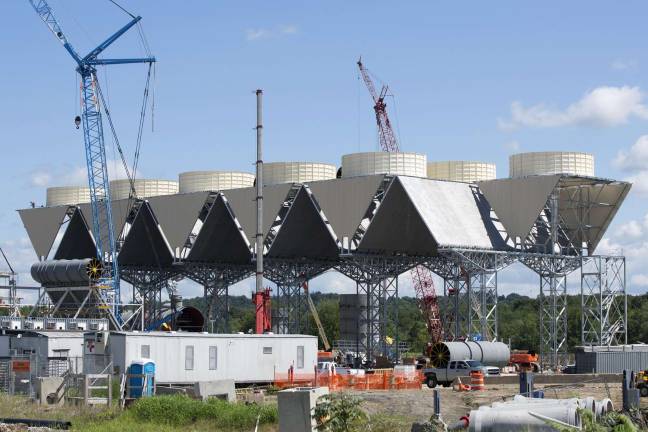 Feds: Former Cuomo aide was inside man for power plant Photo by Robert G. Breese A former aide to Gov. Andrew Cuomo has been charge with soliciting and accepting bribes in return for taking official action to benefit Competitive Power Ventures, which is constructing a power plant in Wawayanda, which will burn fracked gas.