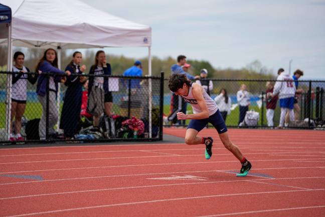 Burke Catholic has four track and field leaders Liam Gralton on the track.