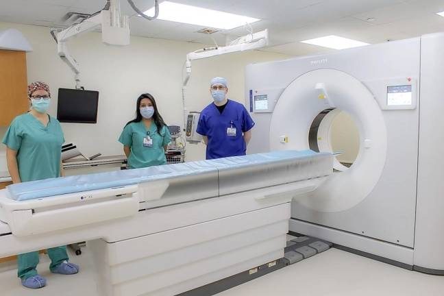 St. Anthony Community Hospital introduces new high-speed, low-dose CT Diagnostic Technology Technicians at St. Anthony Community Hospital and the hospital’s new 256 Slice CT scanner, which can capture a complete image of the heart or brain quickly, reducing radiation exposure and helping to protect the imaged tissue and surrounding areas. Provided photo.