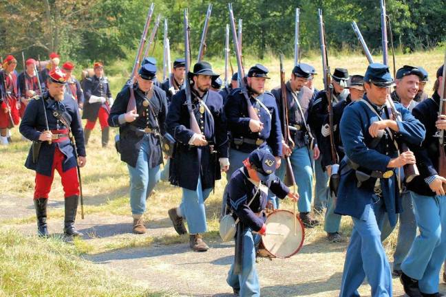 At 12:30 p.m. the troops gather for battle and safety inspection.