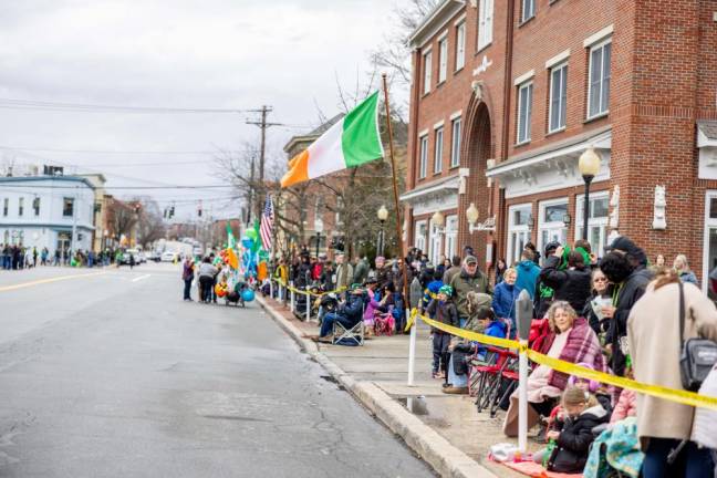 Crowds Line the streets bundled in coats and hats at the Mid Hudson St. Patrick’s Day Parade in Goshen on March 10, 2024. Photo by Sammie Finch