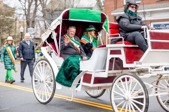 2024 Grand Marshal Unateresa Sheahan Gormley and her husband Sam Gormley in the Mid Hudson St. Patrick’s Day Parade in Goshen on March 10, 2024. Photo by Sammie Finch