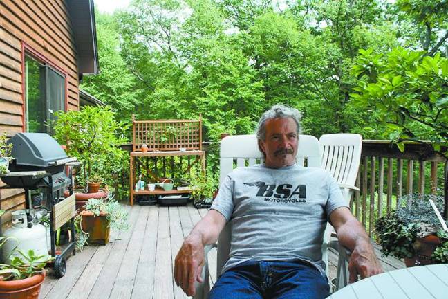 Coyote Ridge Music series brings great music home Photo by Linda Smith Hancharick Bernie Stapleton sits on his deck which leads into the room where the Coyote Ridge Music series is held.