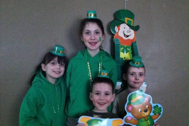 Celebrating St. Patrick's Day Maggie Silva of Warwick, N.Y. "Four of Warwick's young leprechauns celebrate their Irish heritage. Happy St. Patrick's Day, New York."