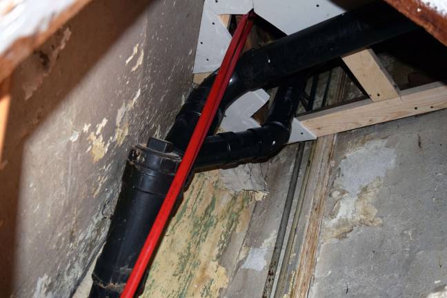 Burglar found hiding in ceiling of Frank’s Pizzeria The alleged robber hid above the black pipes in the broom closet, but according to Frank Rinaldi, they have repaired the area so something similar cannot occur.