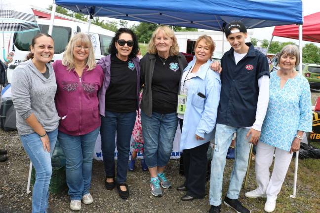 Cruisers for Critters classic car and bike show raises $3,000 for Warwick Humane Society Photo by Roger Gavan Celebrating the conclusion of a successful fundraiser for the Warwick Valley Humane Society are, from left: Liz Cruz of Moroney's Harley; columnist Donna Kessler; Suzyn Barron, president of the Warwick Valley Humane Society; and Vice President Celia Ross; WTBQ Station Manager Taylor Sterling; "D.J. Shark" Branden Tyler Scire and volunteer Marge King-Porter.
