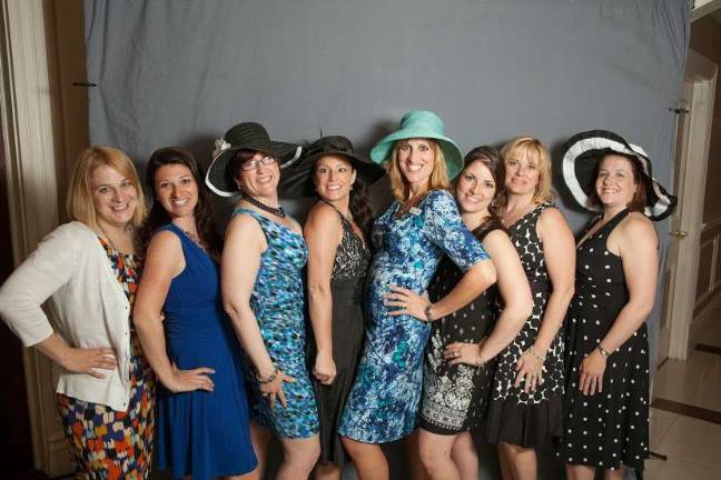 It's a 'Night at the Races' for the Junior League From left, leaders of the Junior League of Orange County Kristy Horaz, Amanda Merli, Lori Anne Wolkoff, Erin Bratton, Heather Batelic, Tara Bliss, Karen Brock and Diane Davis.
