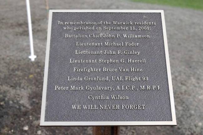 The names of the people from Warwick who died in the terrorist attacks 20 years ago on Sept. 11, 2001. Cynthia Wilson’s name was added to the program. She had purchased a home in Warwick but had not moved before her death in the 9/11 attack. Photo by Robert G. Breese.