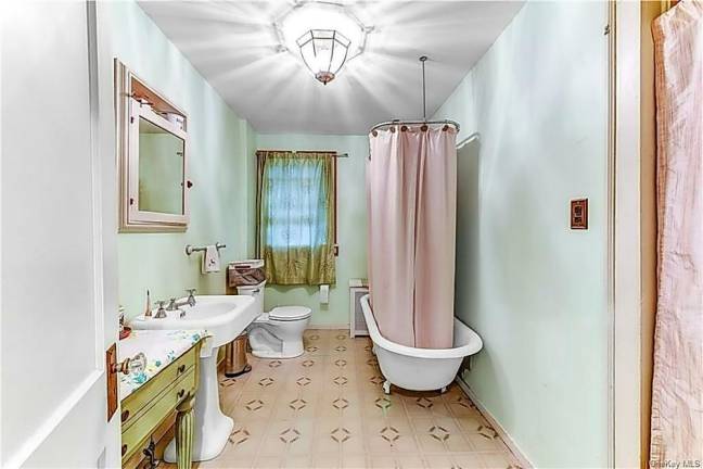 Charm and village convenience with quiet patio over fenced yard Charm and village convenience with quiet patio over fenced yard