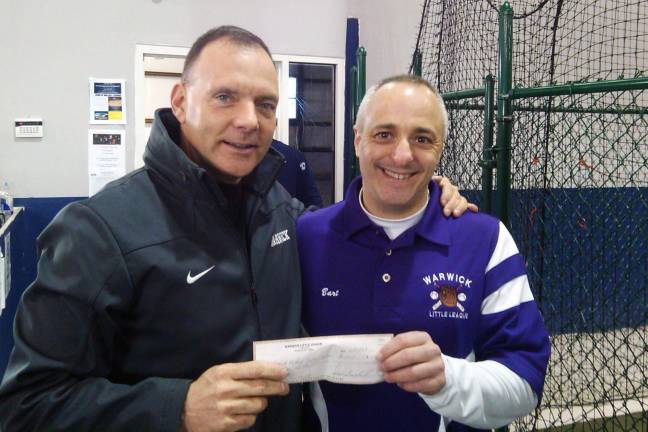 Little League donates $750 to Warwick school athletics Warwick Little League President Bart Amatetti (right) is pictured with Athletic Director Gregory Sirico this weekend at the Little League evaluations. Amatetti presented a check on behalf of the Warwick Little League to the Warwick Valley School District to help pay for the replacement of the indoor batting cage.
