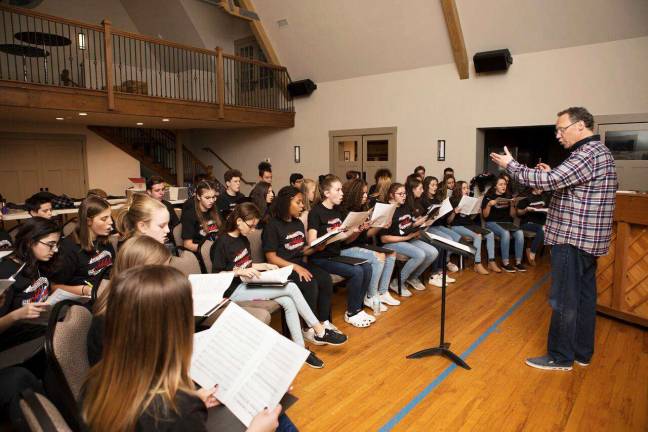 Jubilate youth choir to perform at Cathedral of St. John the Divine in Manhattan Photo courtesy of Jennifer Karon The Jubilate Choir, pictured here at rehearsal with Director Dr. David Crone, has been selected to perform at the Episcopal Charities Tribute Dinner this Monday, Dec. 3, in New York City.