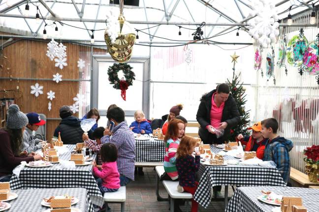 Christmas events celebrated at Pennings Farm Market All ages were invited to decorate a preassembled holiday Gingerbread House where they could be creative with dozens of candy supplies, icing and graham crackers, all included, for a $20 fee.