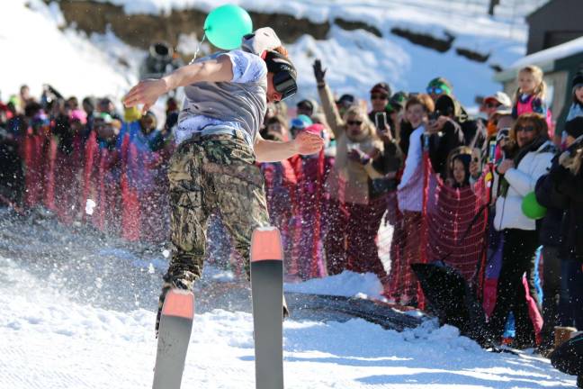 Mt. Peter holds March Spring Rally with Wacky Water Skiing Contest Twisting and turning but he made it.