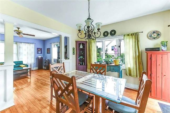 Charm and village convenience with quiet patio over fenced yard