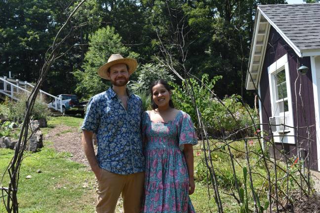 Local green thumbs harvest top honors Patrick Scott and Sohan Dhesi took home first place this year for their Florida, N.Y., regenerative ‘tiny farm.’ They’re standing in front of a living fence made of braided dogwood saplings. (Photo by Becca Tucker)
