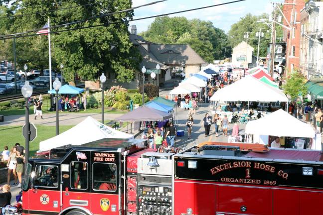 Twenty-first annual Ladies Night Out and Queen for a Day set for Aug. 23 File photo by Roger Gavan Activities on Railroad Green during last year's "Ladies Night Out" in the Village of Warwick. This year's event will be held Thursday, Aug. 23, from 3 to 9 p.m.