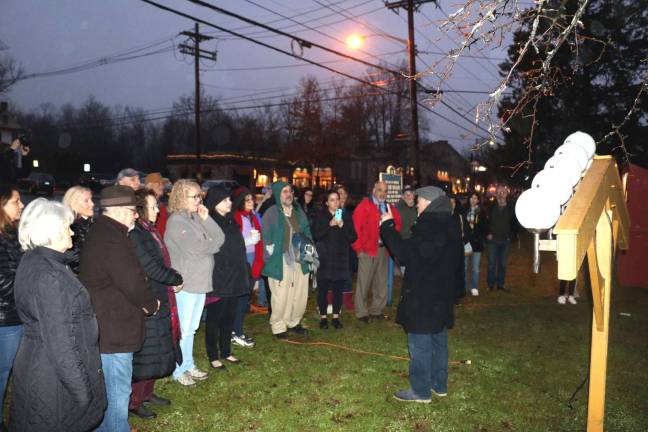 Residents celebrate Hanukkah at 25th anniversary of Warwick Menorah lighting It had been raining lightly on Sunday evening, December 2, the first night of Hannukah, the beginning of the eight-day Jewish Festival of Lights. But nevertheless a crowd of about 50 residents, including Town of Warwick Supervisor Michael Sweeton, Deputy Supervisor James Gerstner and Mayor Michael Newhard, gathered in Lewis Park as business owner Moshe Schwartzberg began officiating at the Menorah lighting of the first candle, a ceremony he has conducted for the past 25 years.