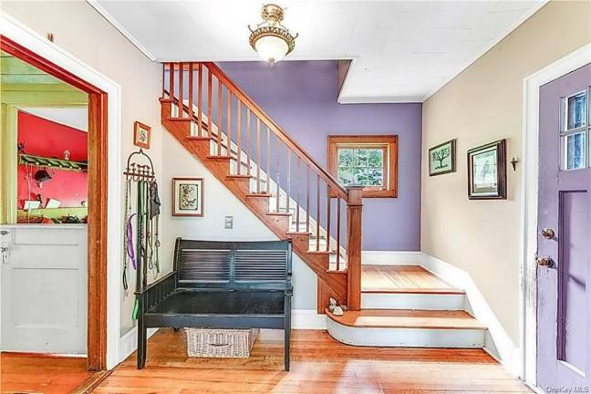 Charm and village convenience with quiet patio over fenced yard Charm and village convenience with quiet patio over fenced yard